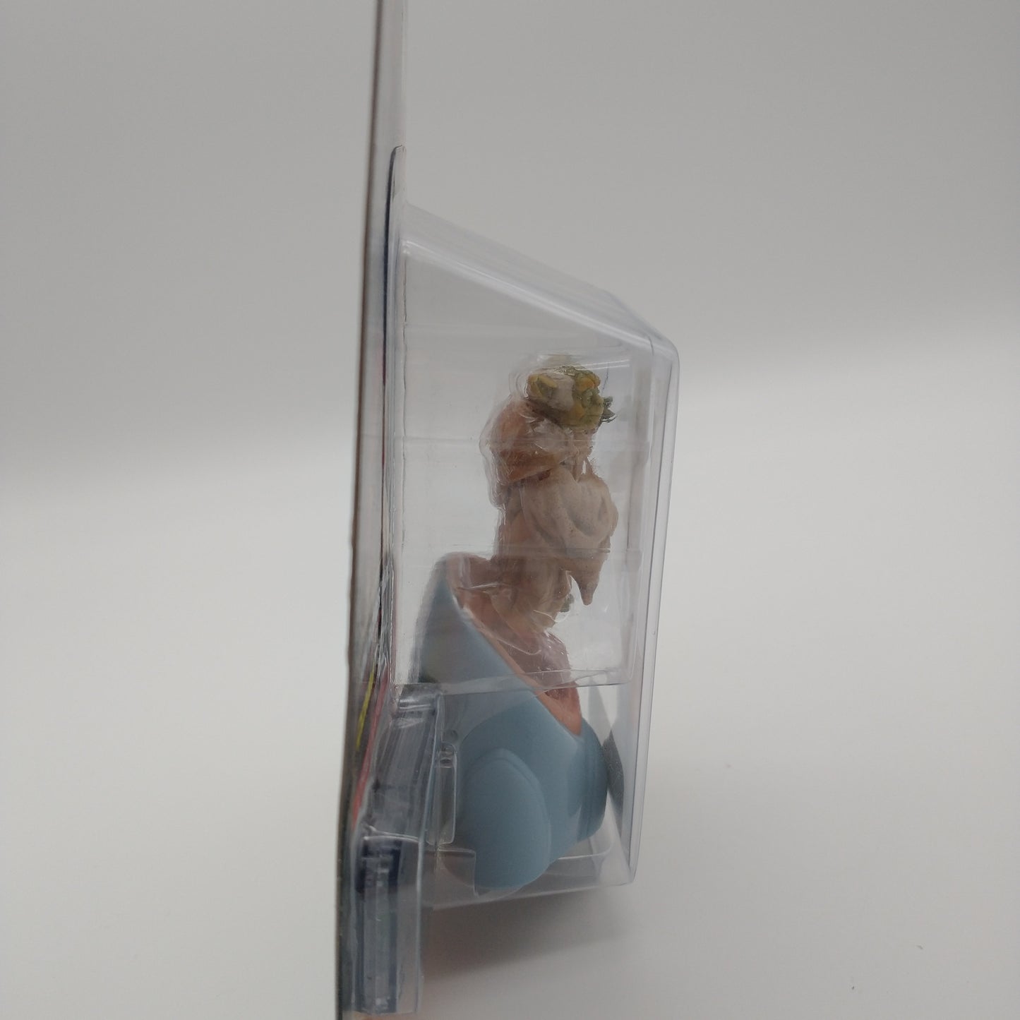 A picture of the left side of the cart and bubble. The action figure is inside.