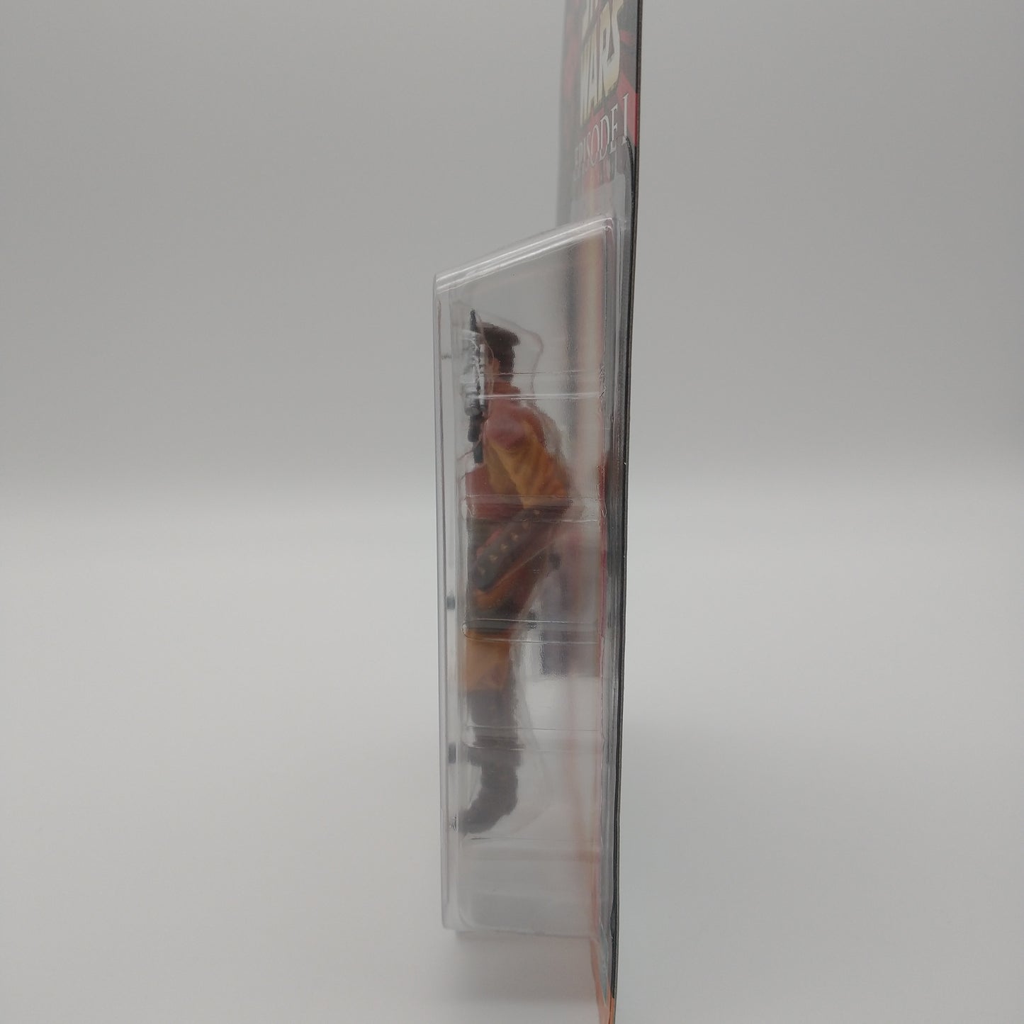 A picture of the left side of the cart and bubble. The action figure is inside.