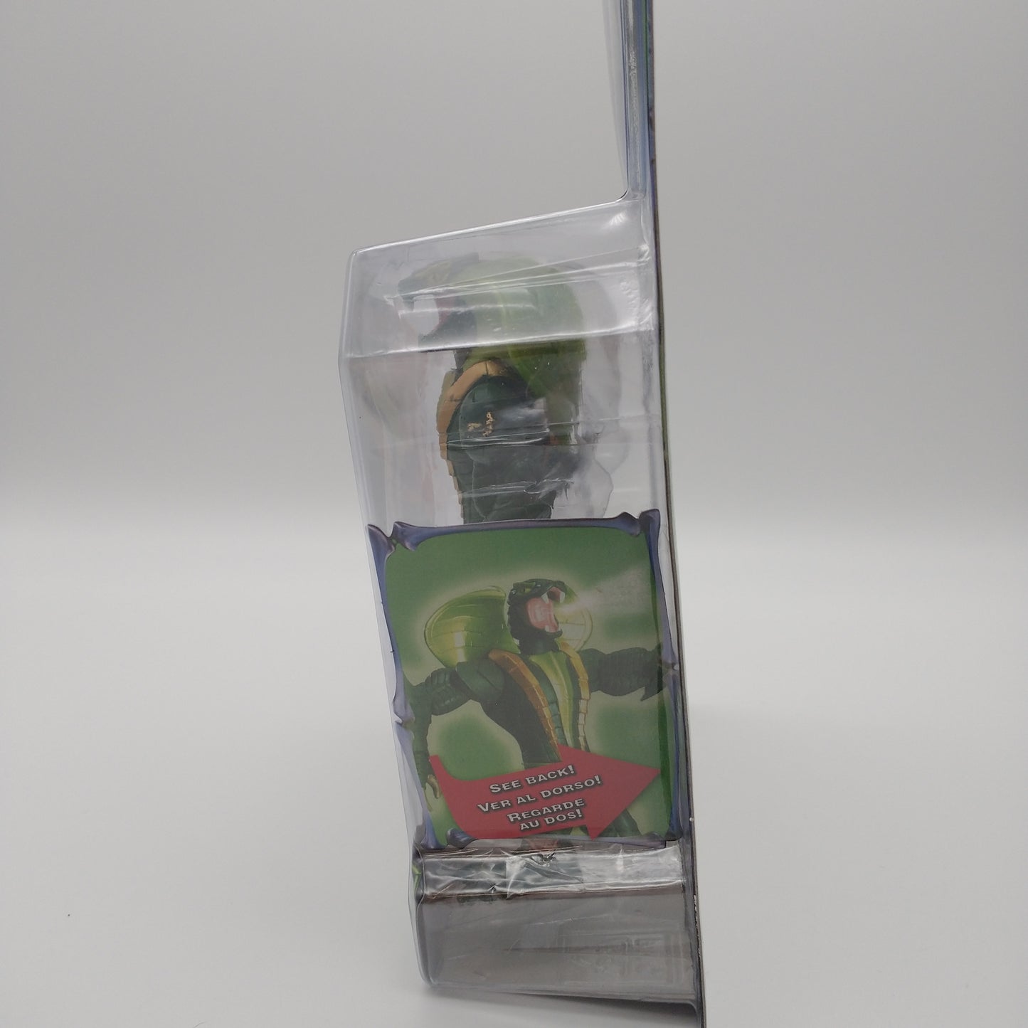 A picture of the left side of the cart and bubble. The action figure is inside.
