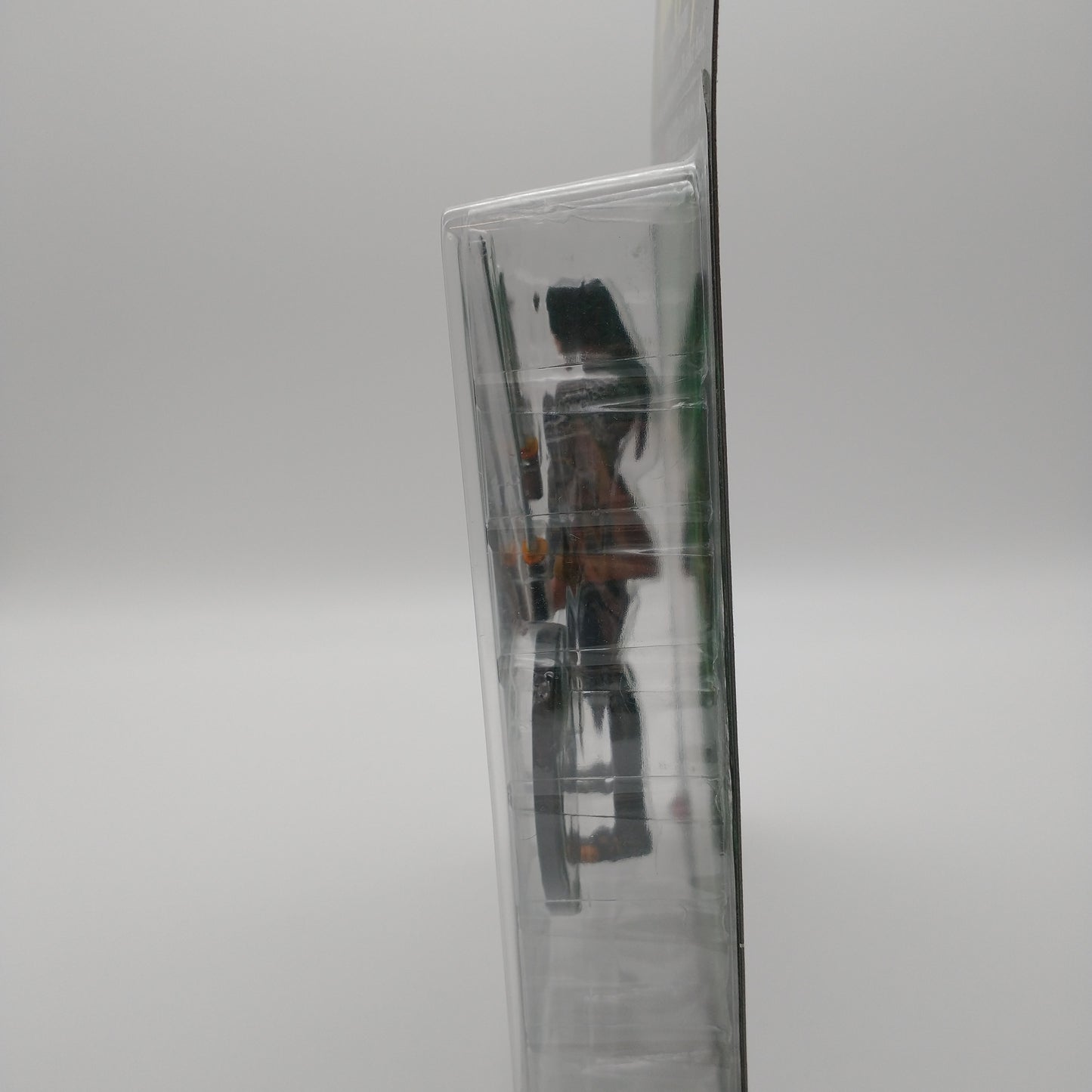 A picture of the left side of the cart and bubble. The action figure is inside.