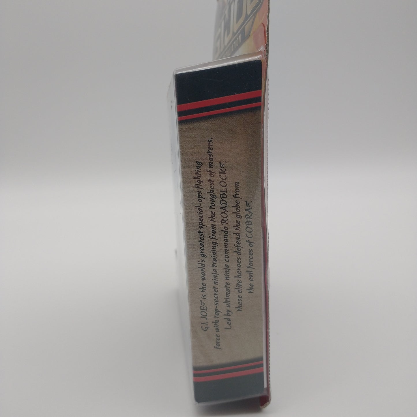 The right side of the box. There is an insert with illegible text on it.