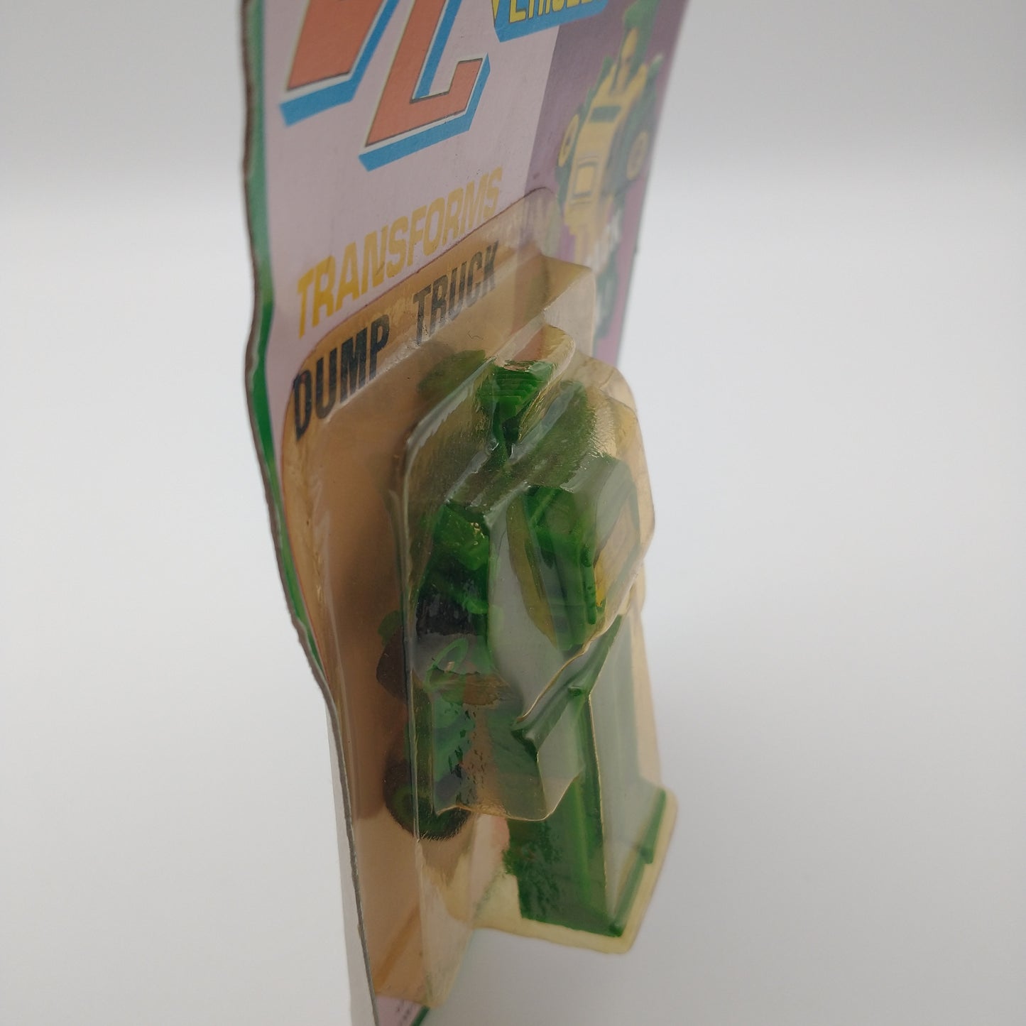 A picture of the left side of the card and bubble. The action figure is inside.