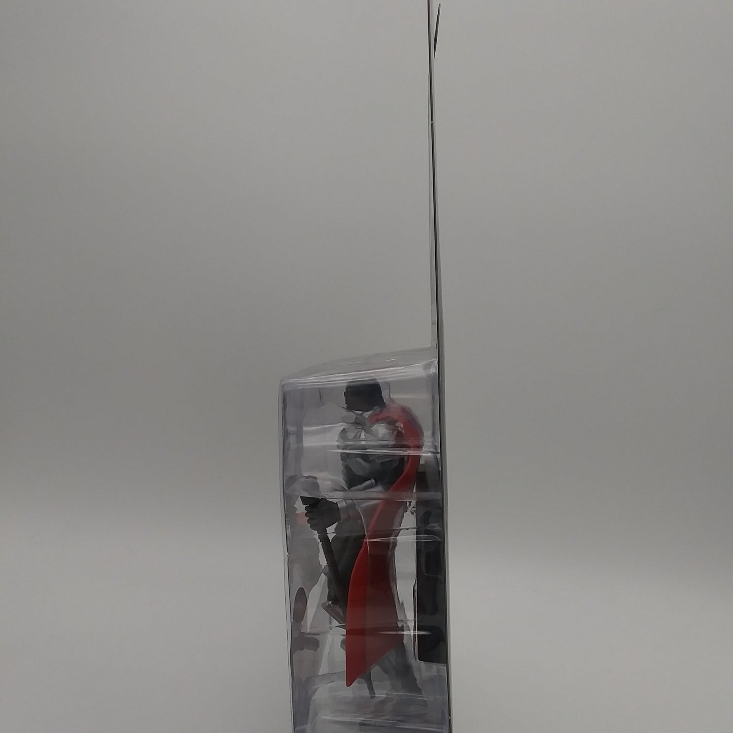 A picture of the left side of the card and bubble. The action figure is inside.