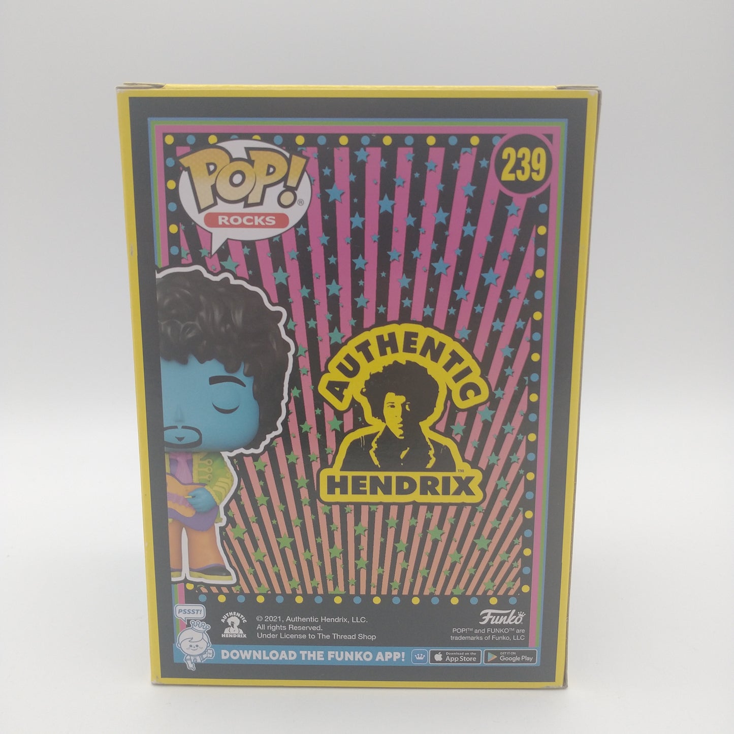 The back of the card featuring images of the action figure and a summary of information about them. It is illegible in the picture.