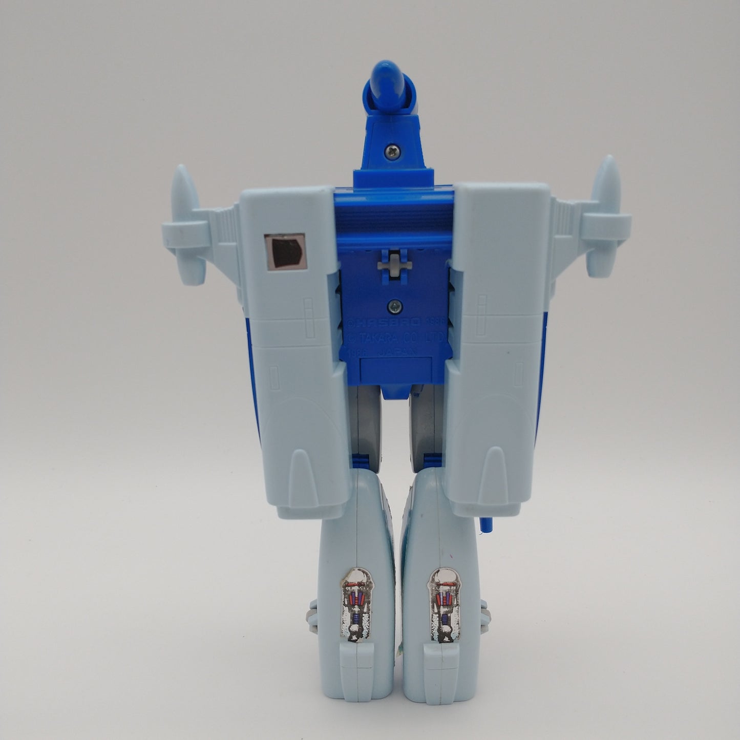 The action figure from behind