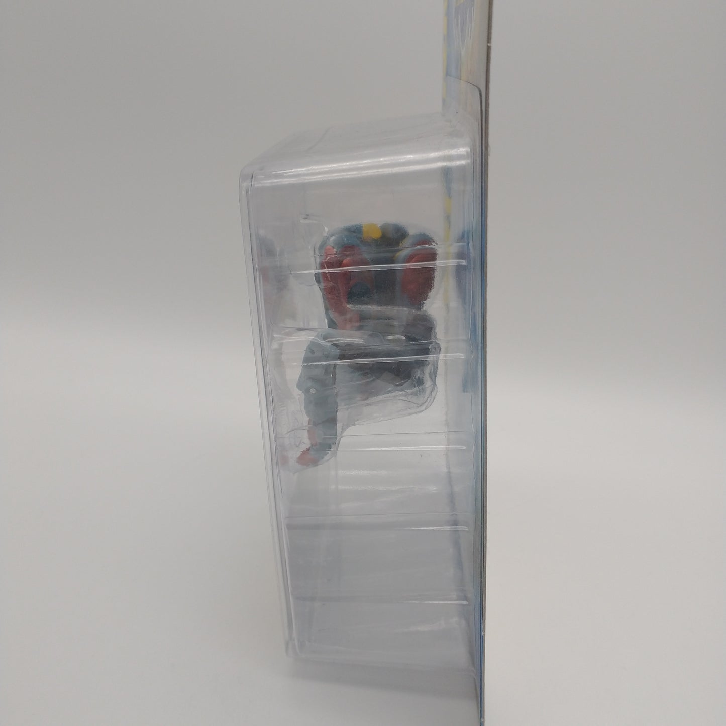A picture of the left side of the card and bubble. The action figure is inside.