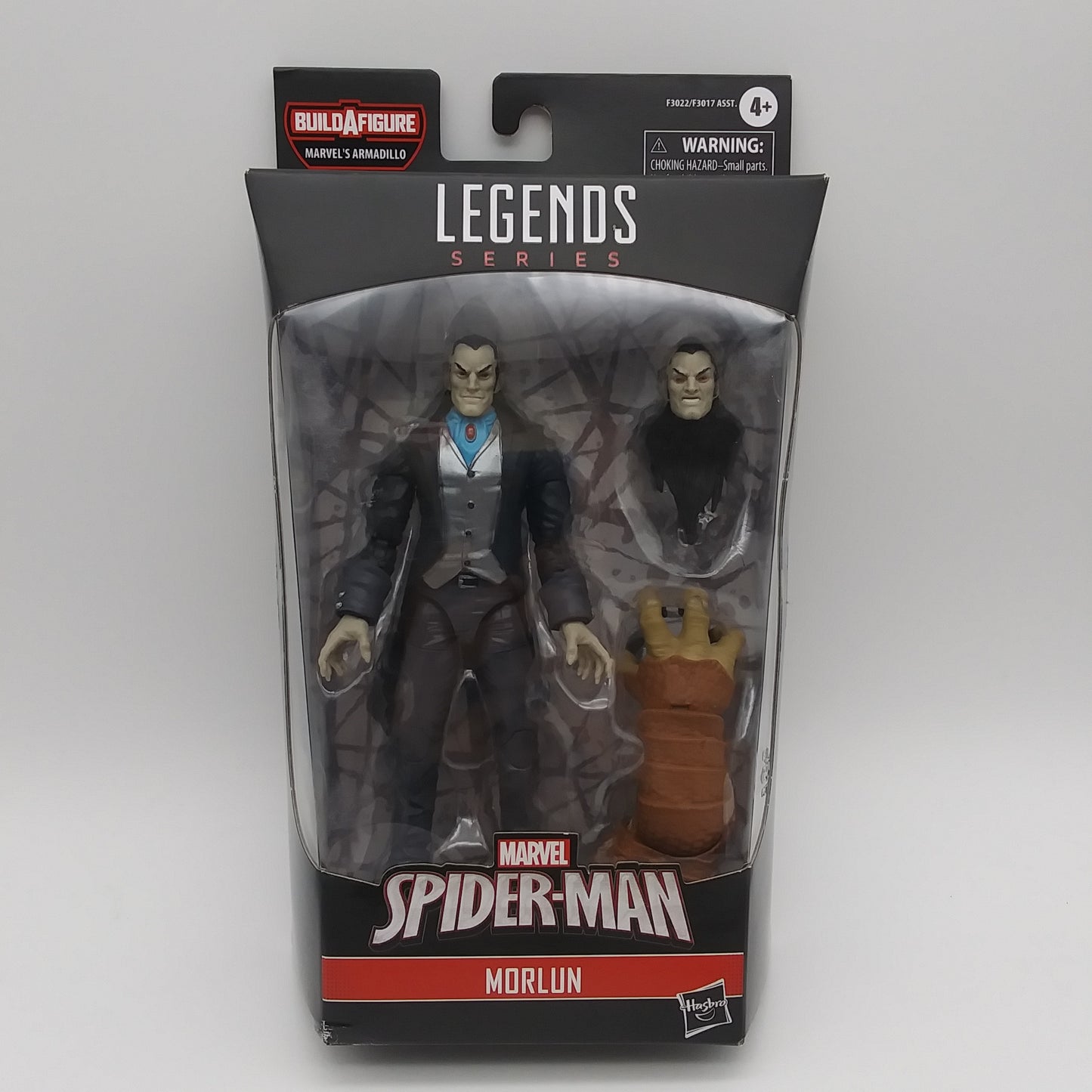 The front of the box and bubble. The bubble is sealed, the action figure inside.
