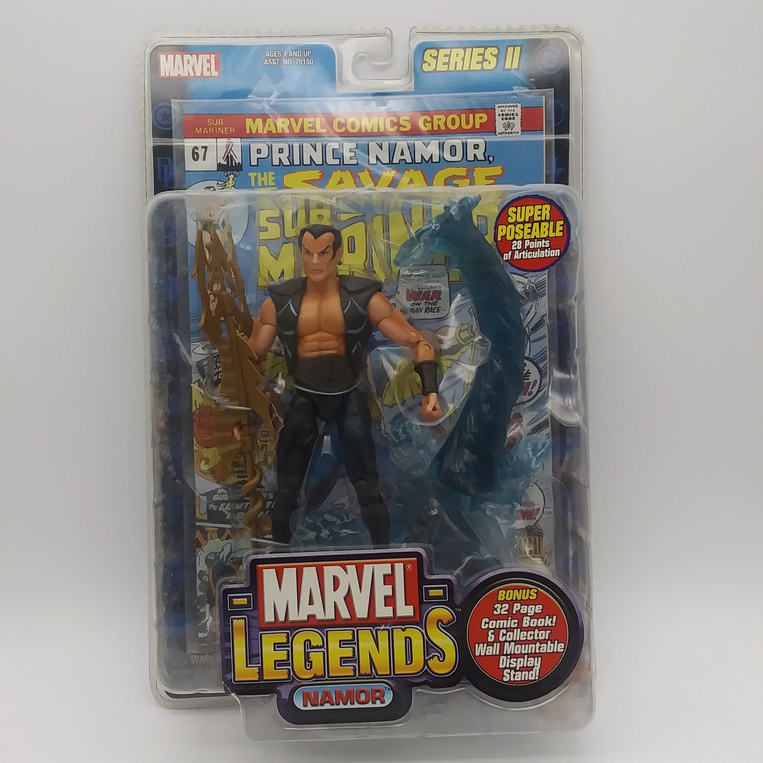 The front of the box and bubble. The bubble is sealed, the action figure inside is white with black hair, wearing a dark blue vest and dark blue pants. He's holding a golden trident.