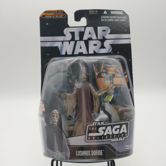 The front of the cart and bubble are intact but slightly dented at the top. The action figure inside is green and wearing a long robe.