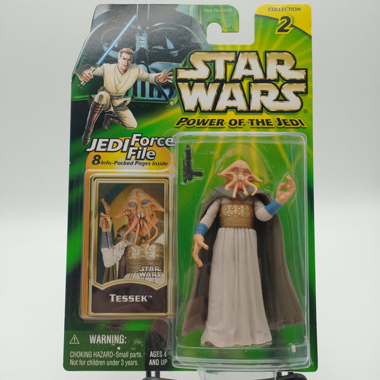 The front of the card and bubble are intact. The action figure is a humanoid alien with a tentacle beard and orange skin. He is wearing a brown cloak and a long tan skirt.