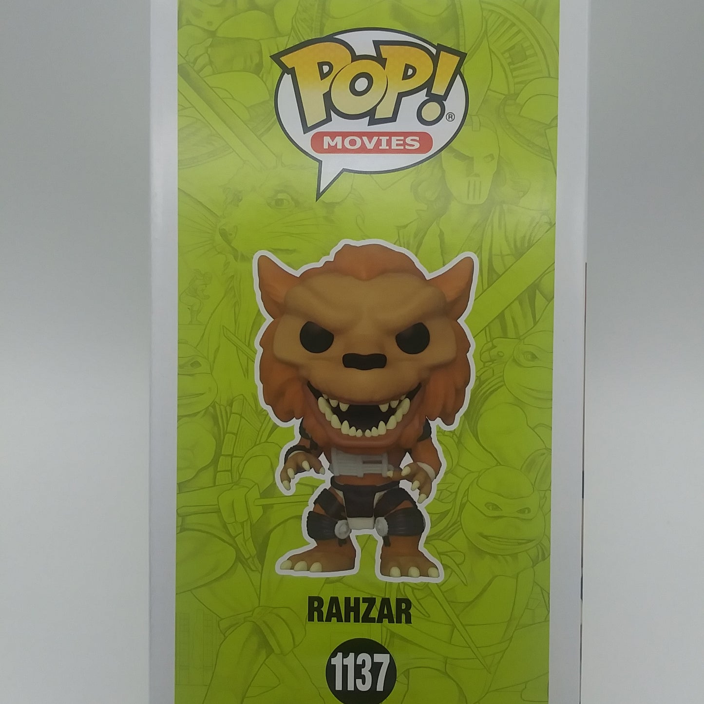 The side of the box featuring a picture of the action figure with the logo of funko pop above it. The name 'RAZHAR' is under the picture. 