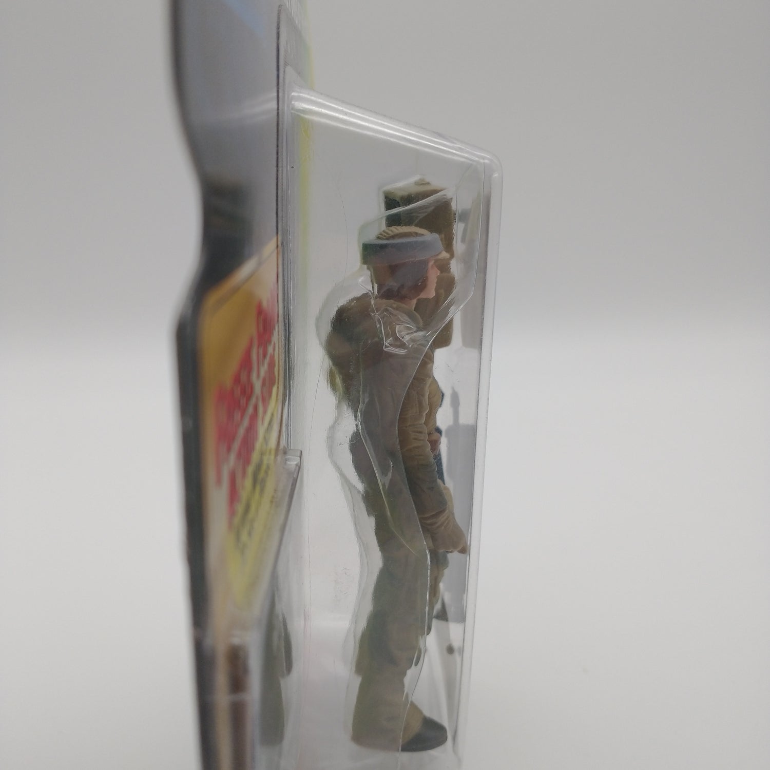 A picture of the left side of the cart and bubble. The action figure is inside.