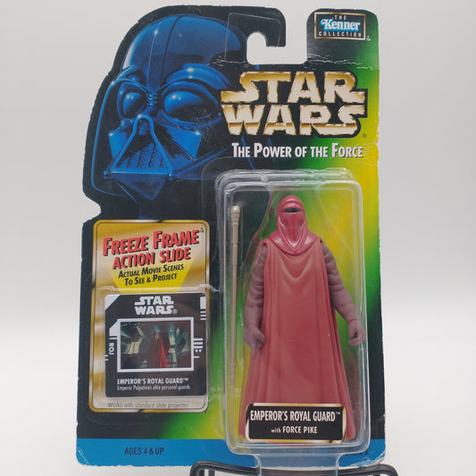 The front of the card and bubble. The action figure inside is wearing a red cloak
