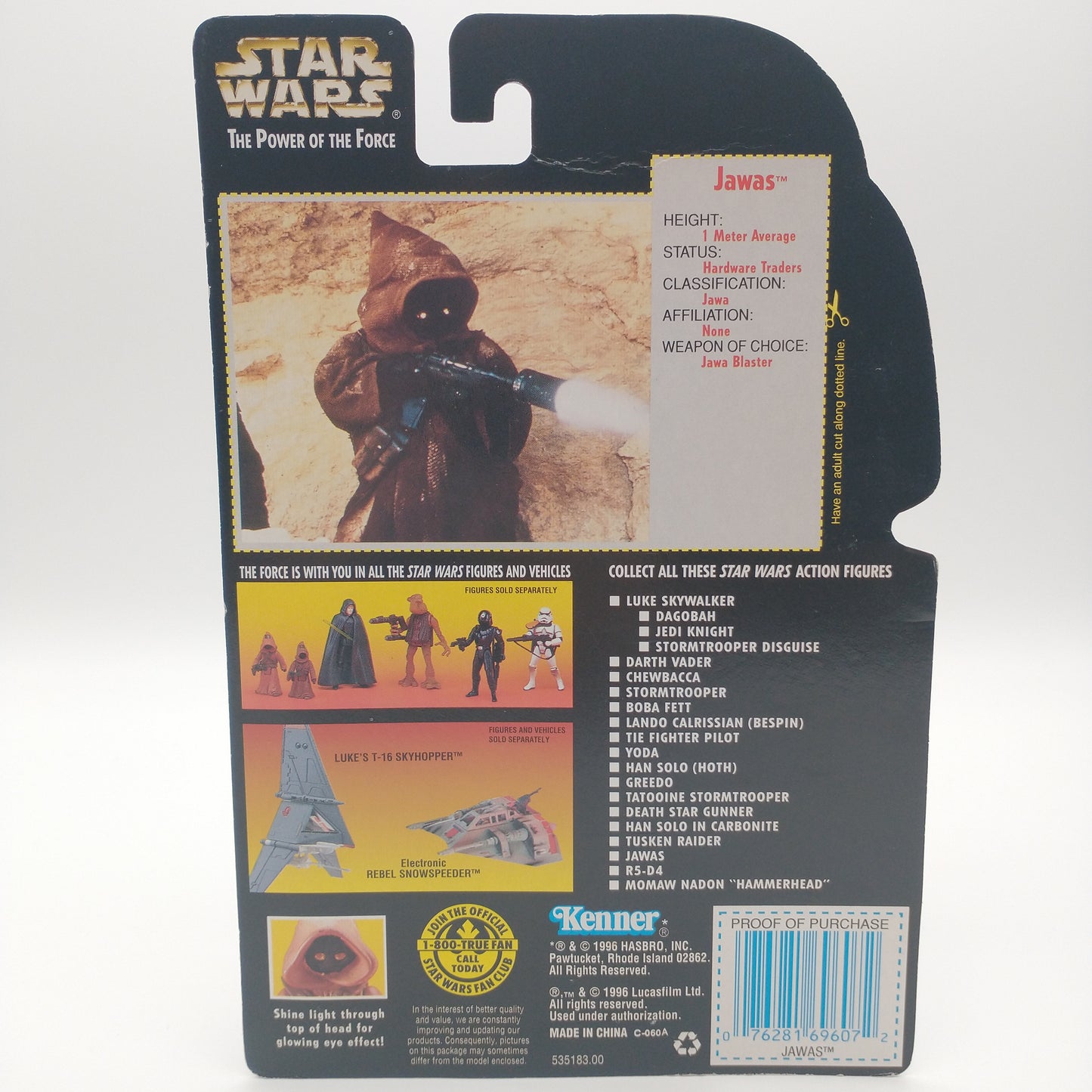 The back of the cart featuring images of the action figure and a summary of information about them. It is illegible in the picture.