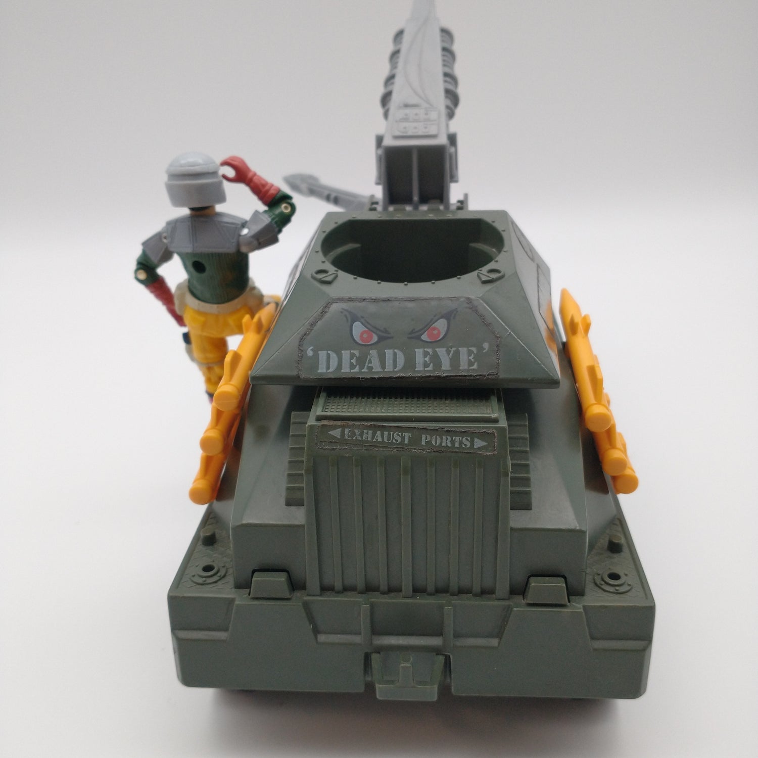 The back of the tank and figure