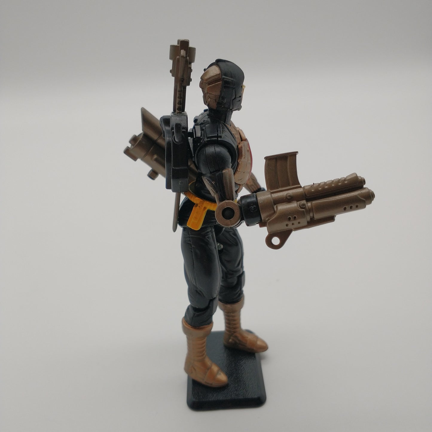  The action figure from the right side