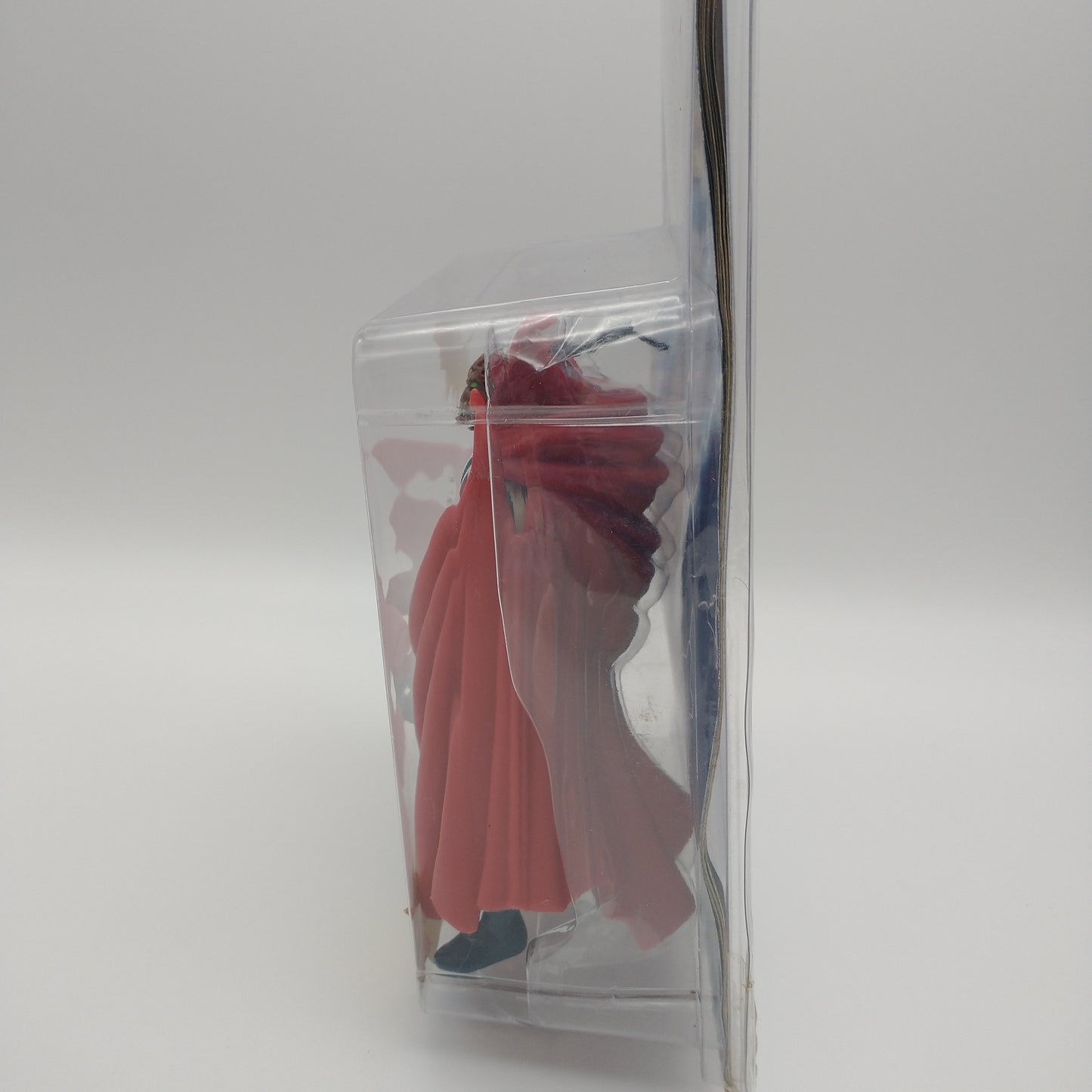 A picture of the left side of the card and bubble. The action figure is inside.