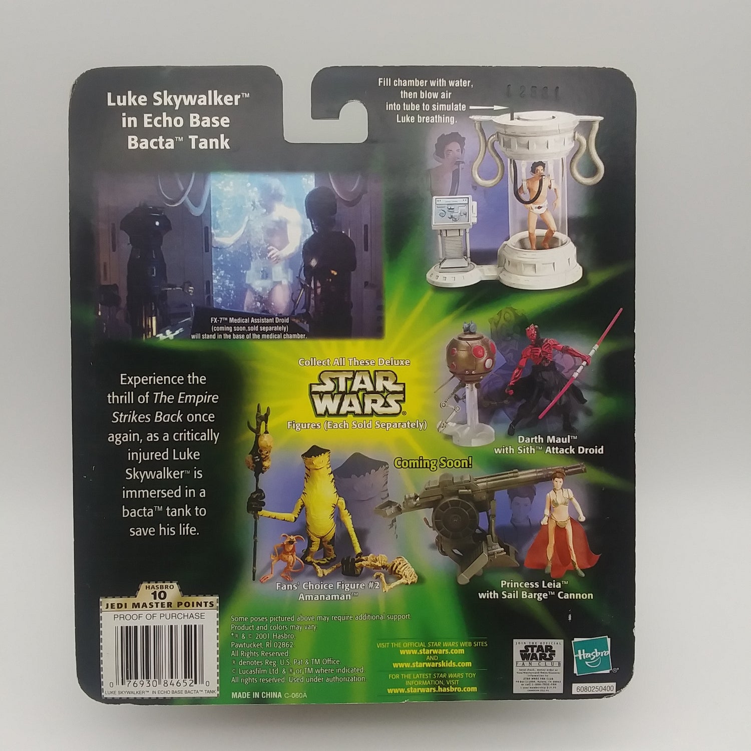 A picture of the back of the card featuring pictures of other action figures available along with various playsets available for purchase. 