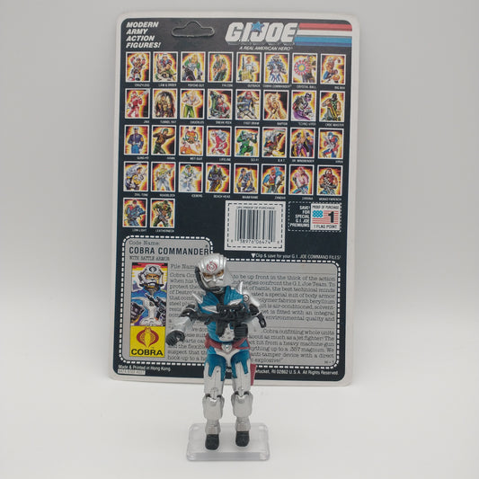 The action figure standing in front of the card with accessories