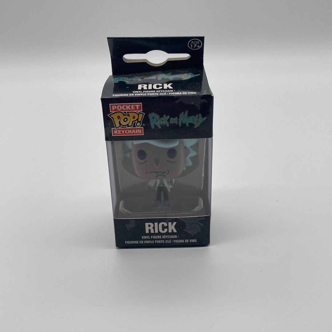 The front of the box and bubble. The bubble is sealed, the action figure inside is light pink with blue hair