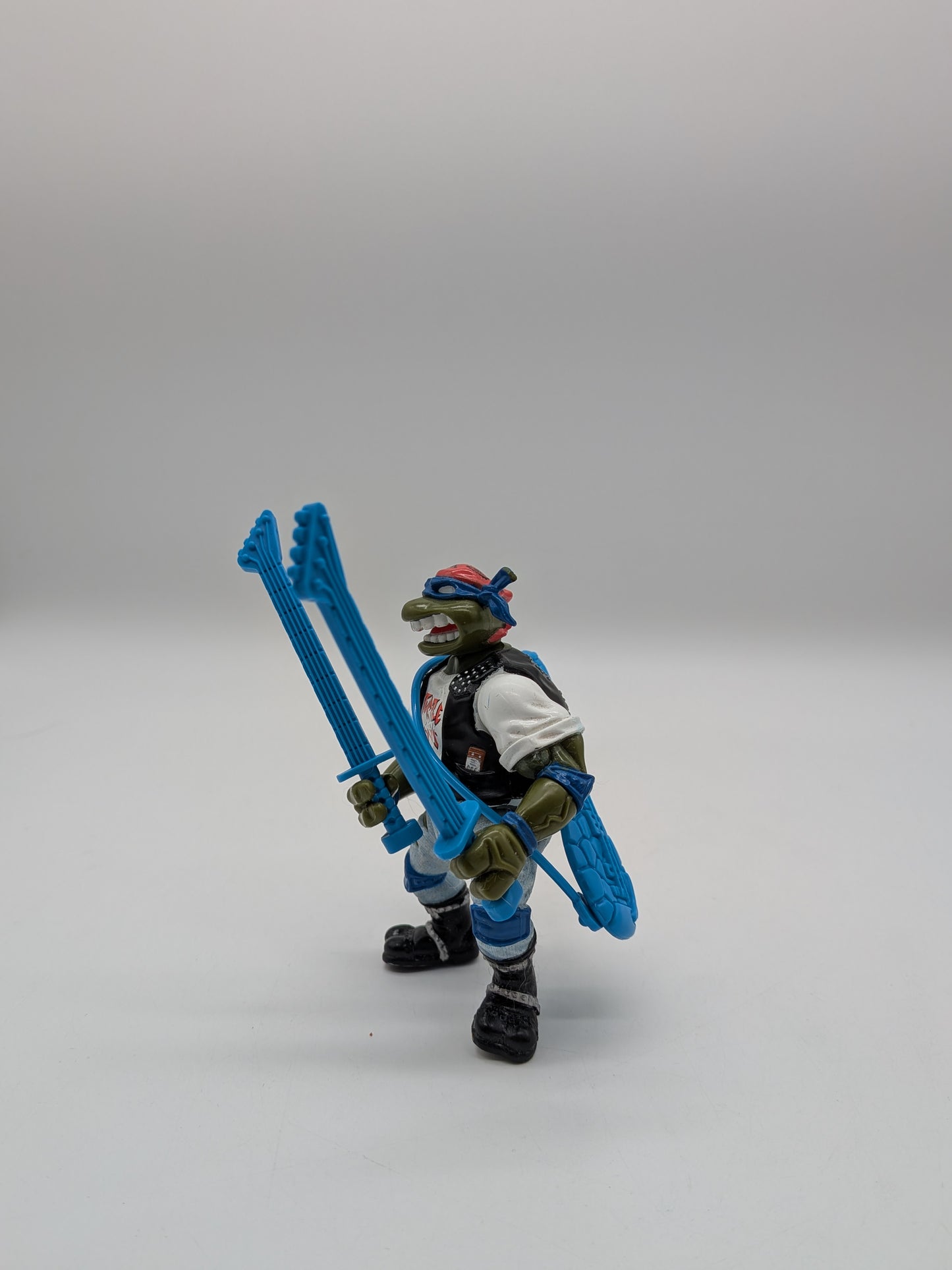 Playmates 1991 Teenage Mutant Ninja Turtles Classic Rocker Leo Action Figure
